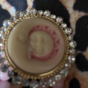 Pink beaded 7 inch stretch bracelet  new. Moon face design. Pretty.